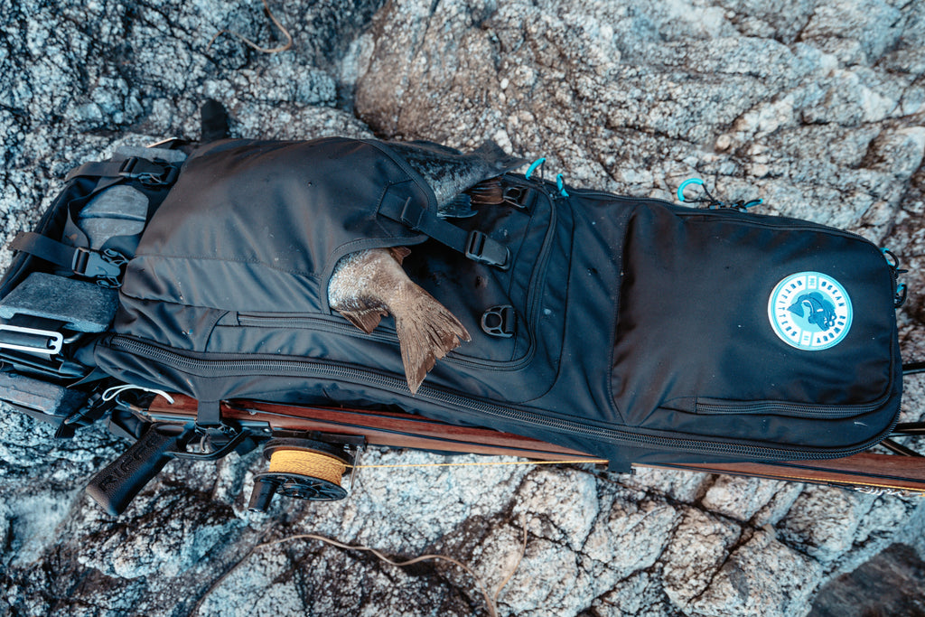 Cabezon-1 spearfishing backpack with speargun straps, black in use with gear